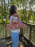 Unik trekantveske i oransje og hvit